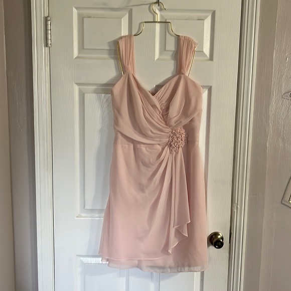 David’s Bridal blush pink with layered roushing and appliqué at waist